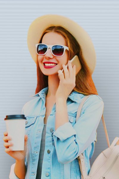 Woman smiling while on a phone call